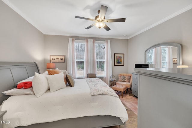 bedroom featuring crown molding and ceiling fan