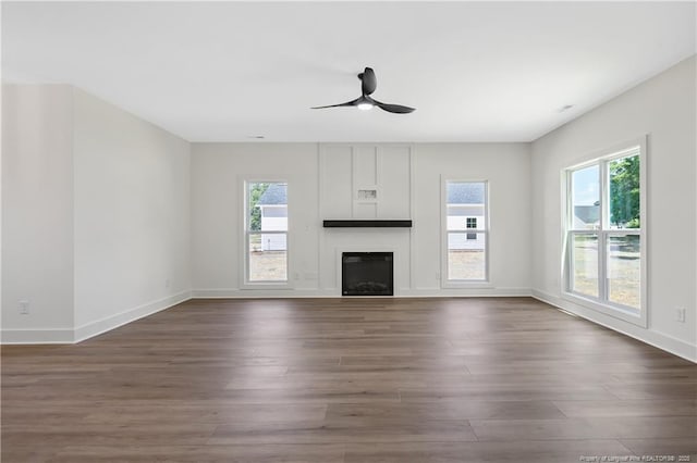 4935 High Branch Ct, Stedman, NC 28391 - unfurnished living room with plenty of natural light, dark wood-style flooring, and a ceiling fan