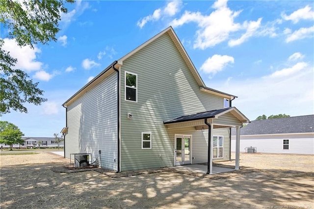 4935 High Branch Ct, Stedman, NC 28391 - rear view of property featuring central air condition unit and a patio area