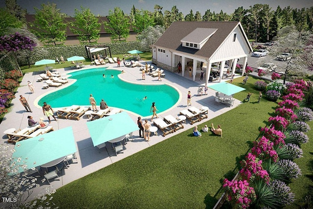 view of pool with a lawn, an outdoor structure, and a patio