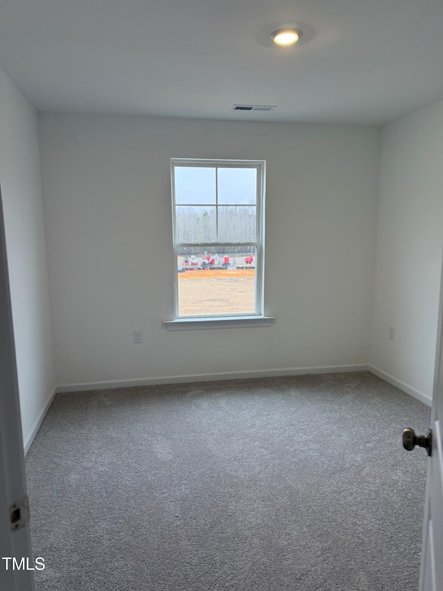 empty room with carpet floors