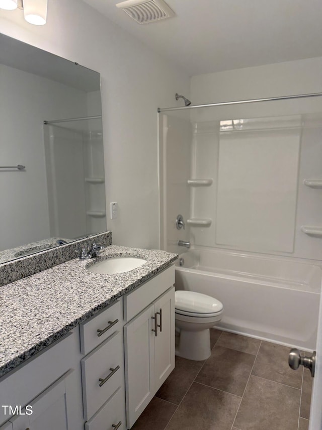 full bathroom featuring  shower combination, toilet, tile patterned floors, and vanity