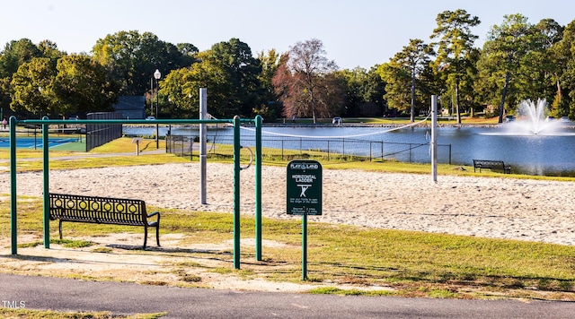 view of home's community featuring volleyball court