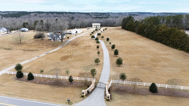 birds eye view of property featuring a rural view