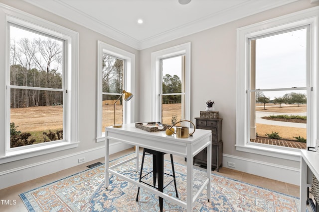 office space featuring crown molding and light tile patterned floors