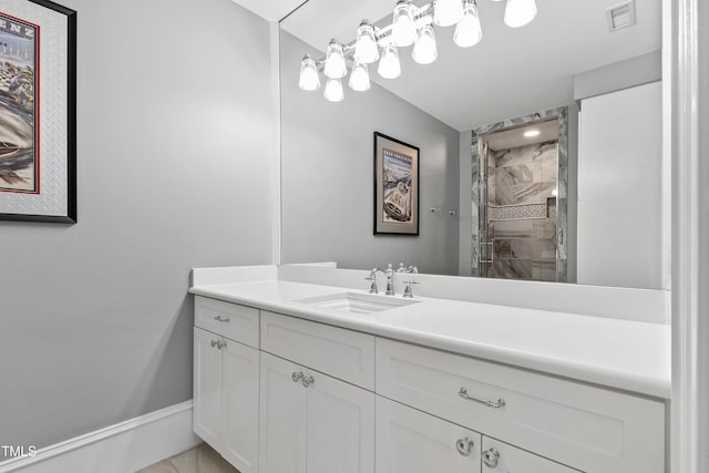 bathroom with vanity and walk in shower