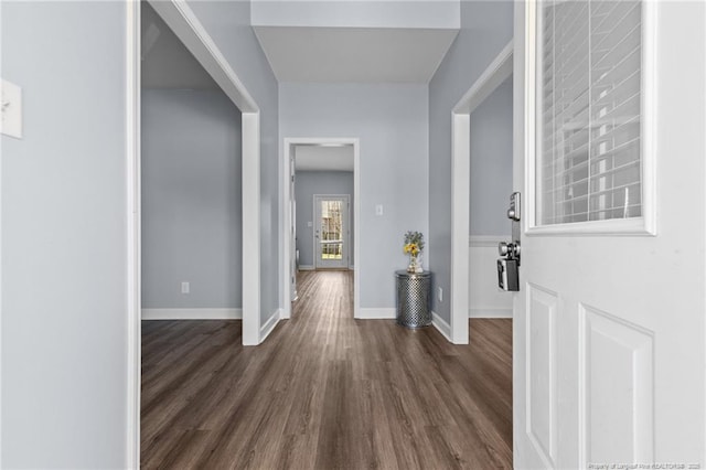 foyer entrance with dark wood-type flooring