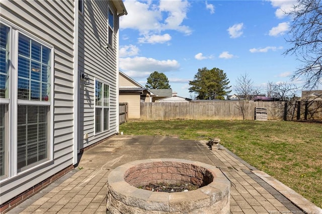 view of patio featuring a fire pit