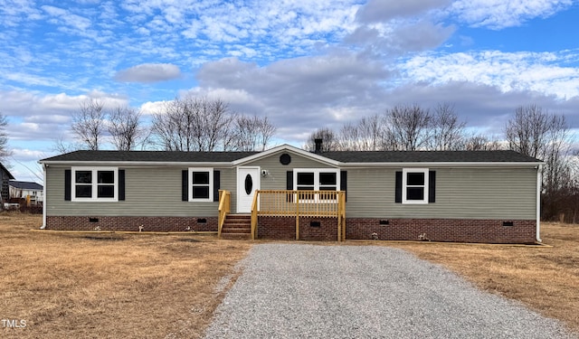 manufactured / mobile home featuring a deck