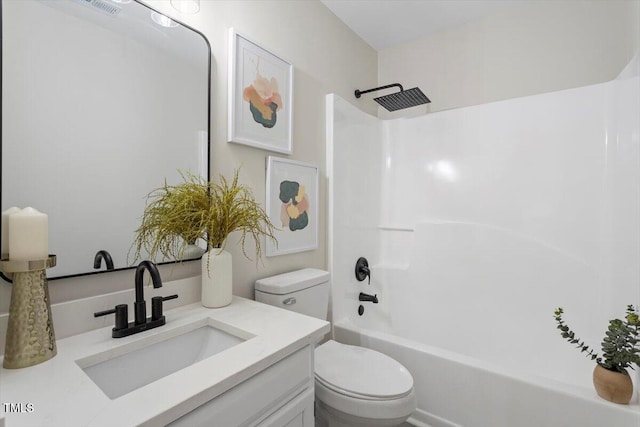 full bathroom with shower / washtub combination, toilet, and vanity