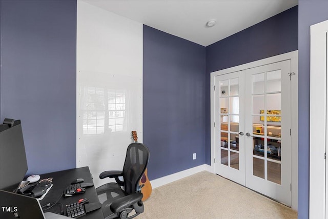 home office featuring french doors and light colored carpet