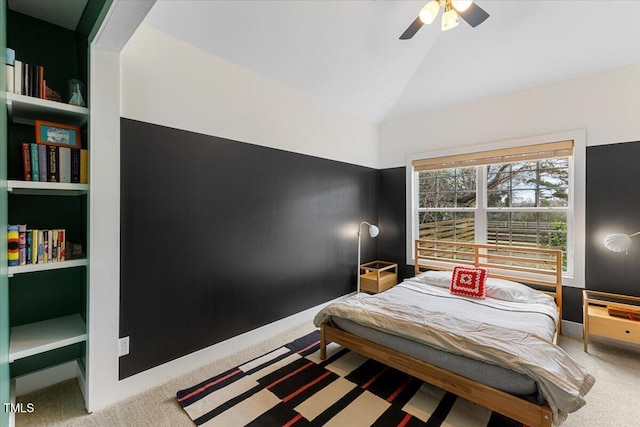 bedroom featuring vaulted ceiling, carpet, and ceiling fan