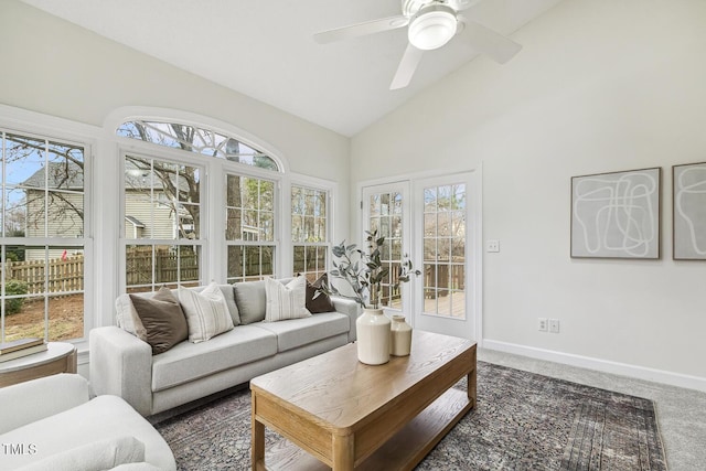 sunroom with french doors, ceiling fan, lofted ceiling, and plenty of natural light