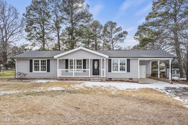 ranch-style house with a carport and covered porch