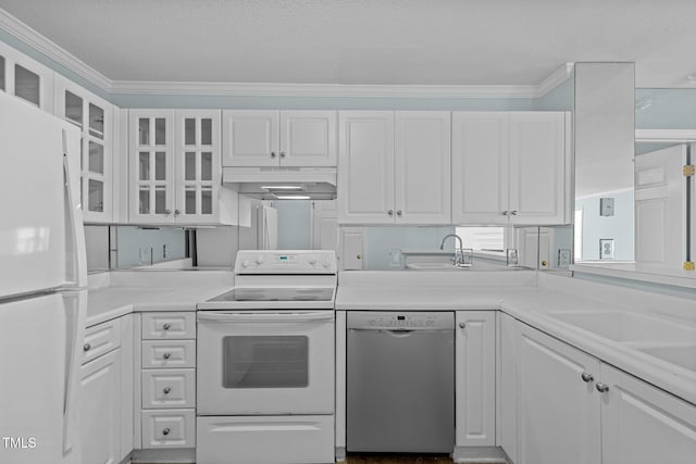 kitchen featuring white cabinets, white appliances, ornamental molding, and sink