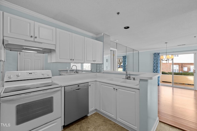 kitchen with white range with electric cooktop, stainless steel dishwasher, white cabinets, decorative light fixtures, and kitchen peninsula