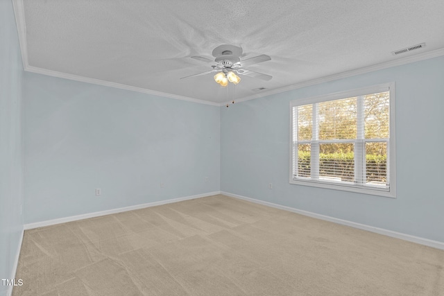 spare room with light carpet, plenty of natural light, and ornamental molding