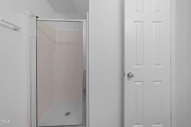 bathroom featuring a stall shower