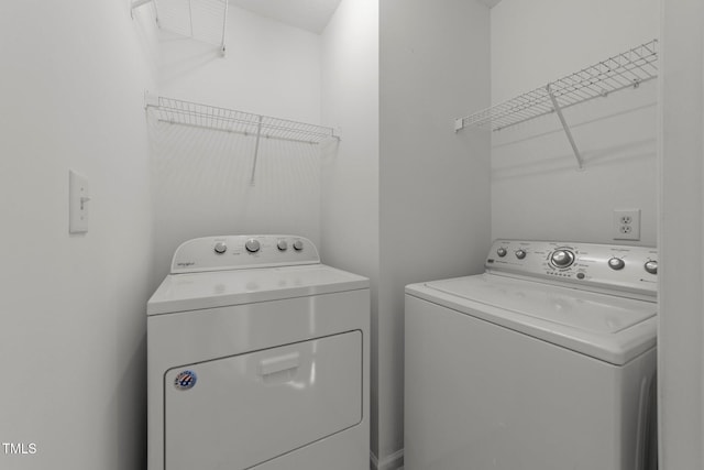 laundry area with laundry area and washing machine and dryer