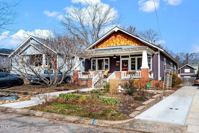 bungalow-style home with a porch