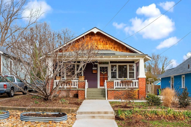 bungalow featuring covered porch