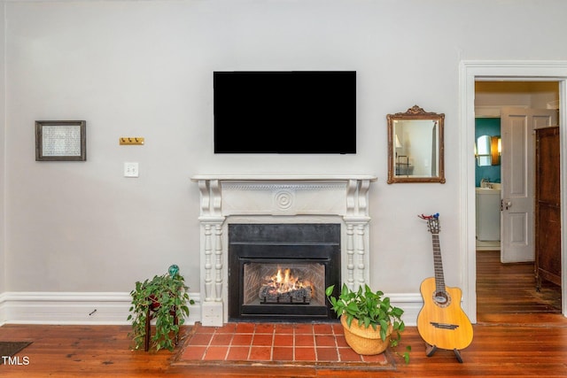 interior details featuring hardwood / wood-style flooring