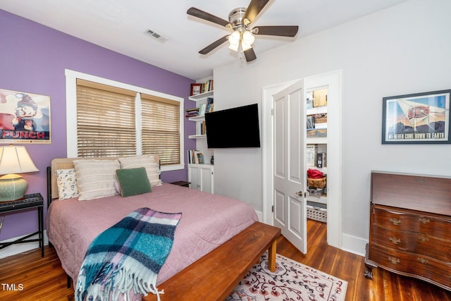 bedroom featuring dark wood-type flooring and ceiling fan