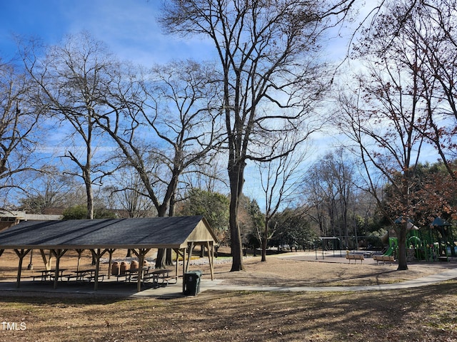 view of property's community with a playground and a gazebo