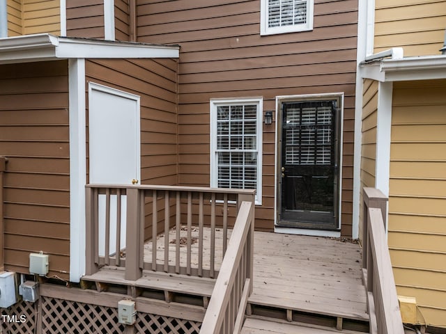 doorway to property with a wooden deck