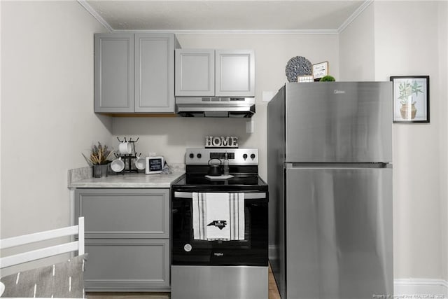 kitchen featuring crown molding, gray cabinets, and stainless steel appliances