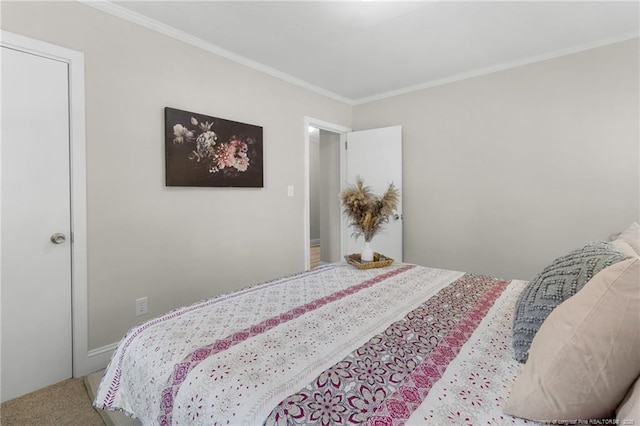 carpeted bedroom with crown molding