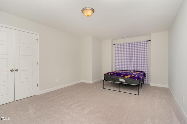 sitting room with light colored carpet