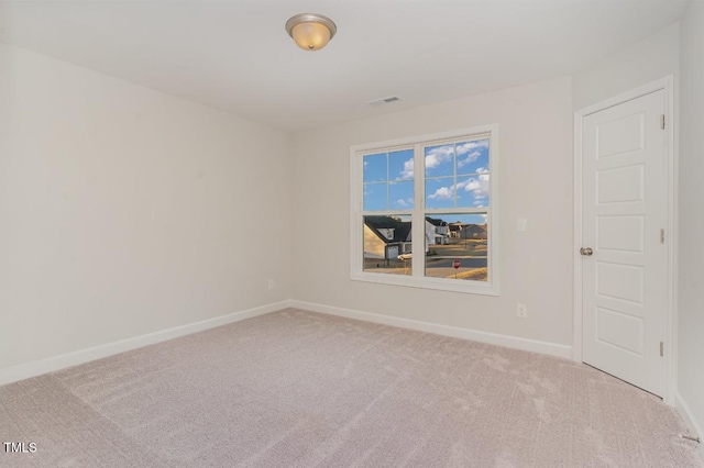 view of carpeted spare room