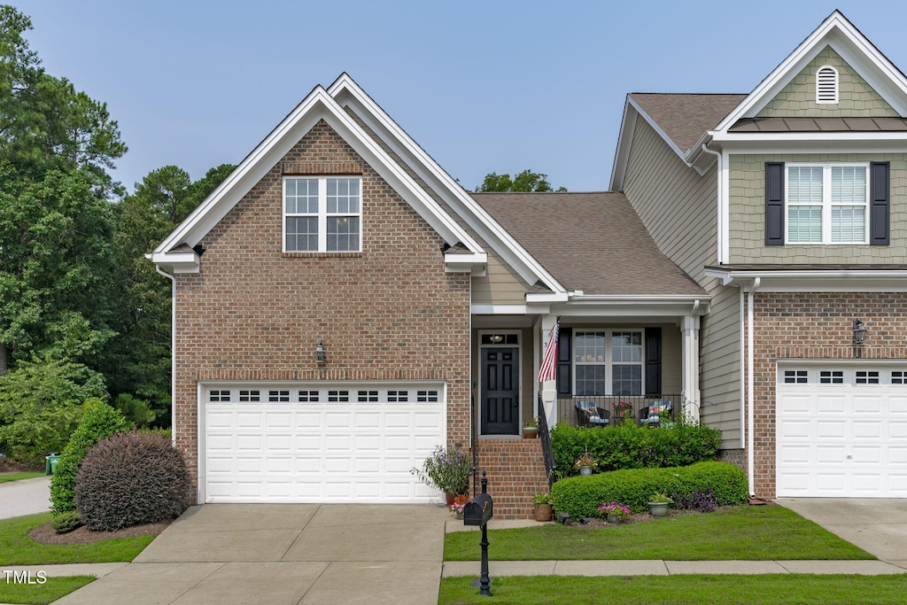 craftsman house with a garage