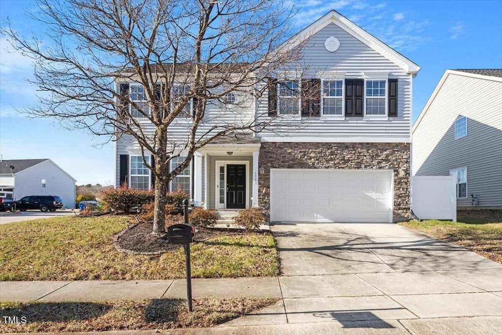 view of front of home with a garage