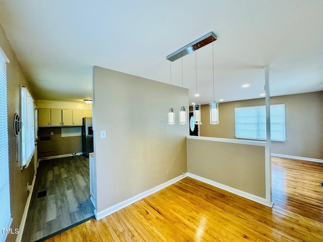 interior space with hardwood / wood-style flooring