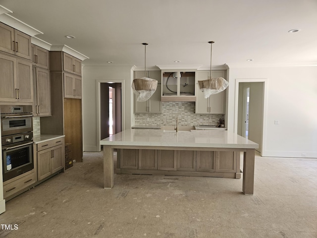 109 Evander Way, Pittsboro, NC 27312 - kitchen featuring decorative backsplash, stainless steel double oven, ornamental molding, light countertops, and a large island with sink