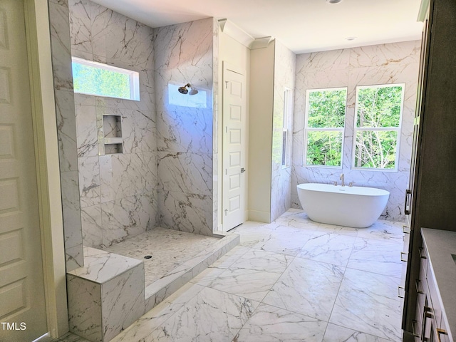 109 Evander Way, Pittsboro, NC 27312 - bathroom with marble finish floors, a freestanding bath, and a marble finish shower