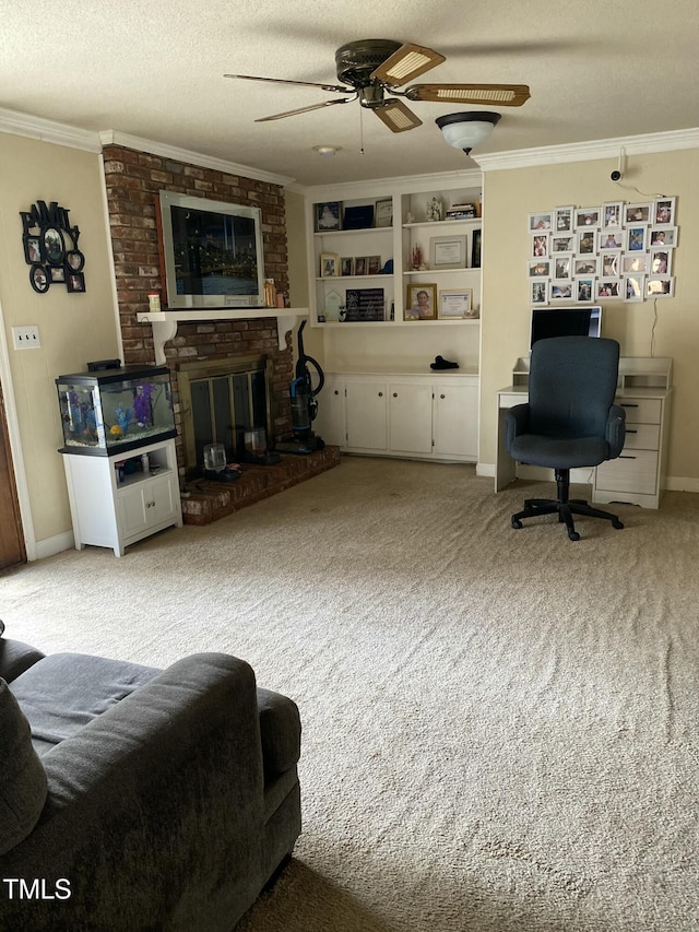 carpeted living room with crown molding, a brick fireplace, ceiling fan, and a textured ceiling