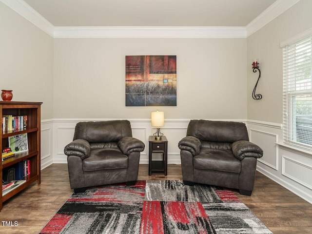 living area with crown molding and dark hardwood / wood-style floors