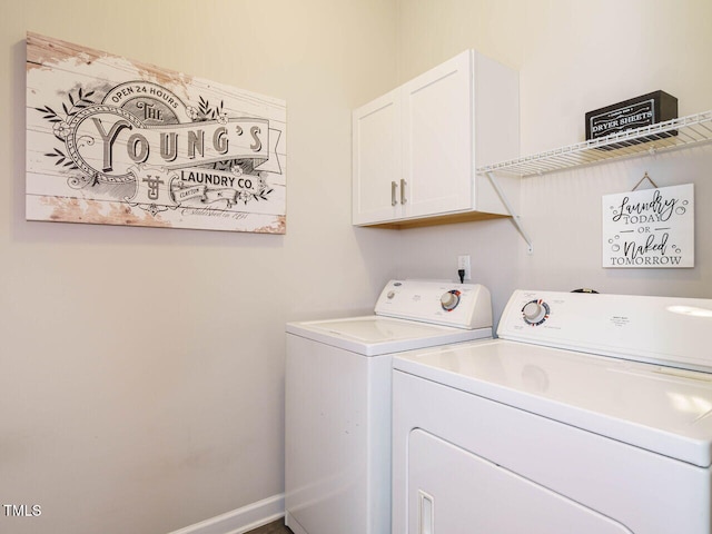 laundry room with cabinets and independent washer and dryer