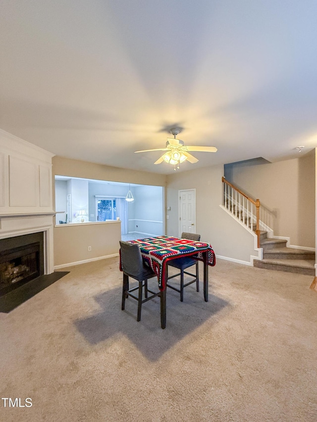 playroom with light colored carpet and ceiling fan