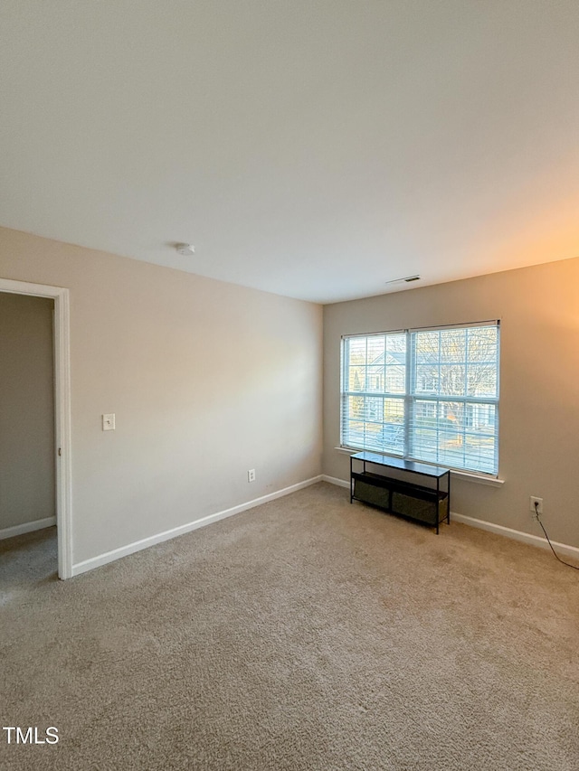 view of carpeted spare room