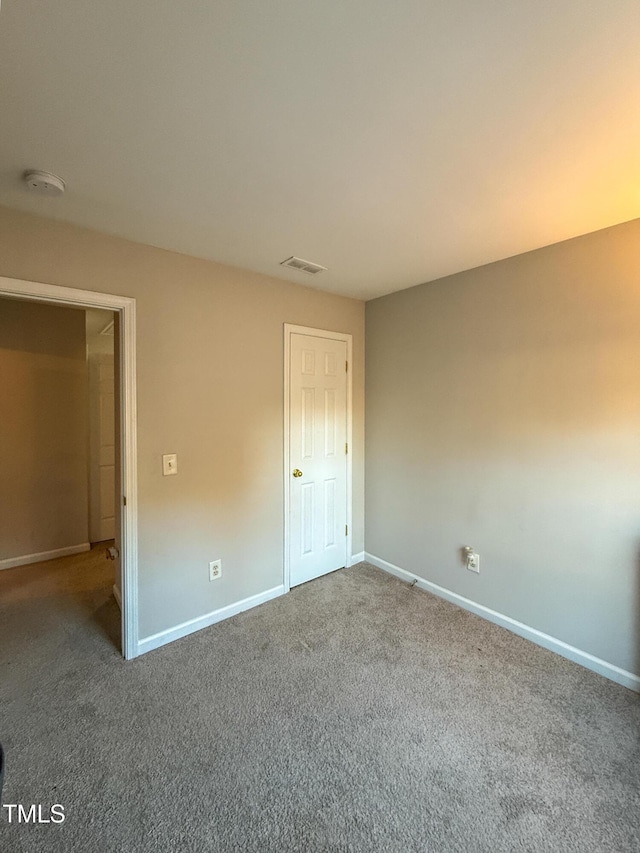 unfurnished bedroom with carpet floors