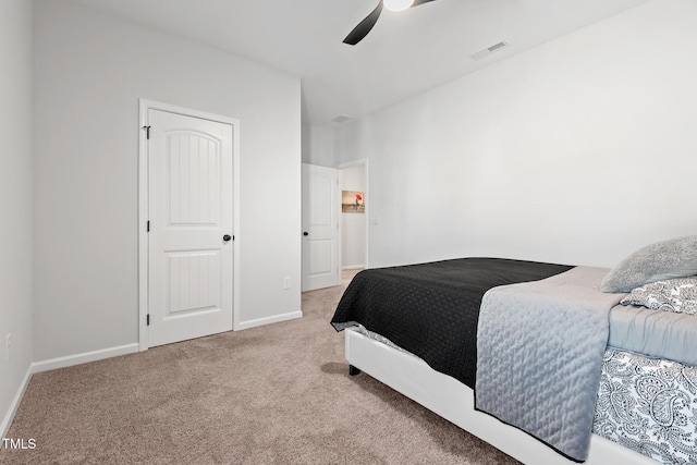 carpeted bedroom featuring ceiling fan