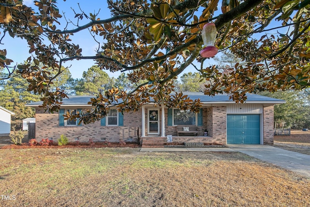 view of front of home featuring a garage and a front lawn