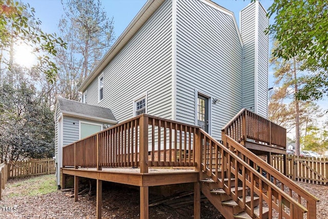 rear view of house with a deck