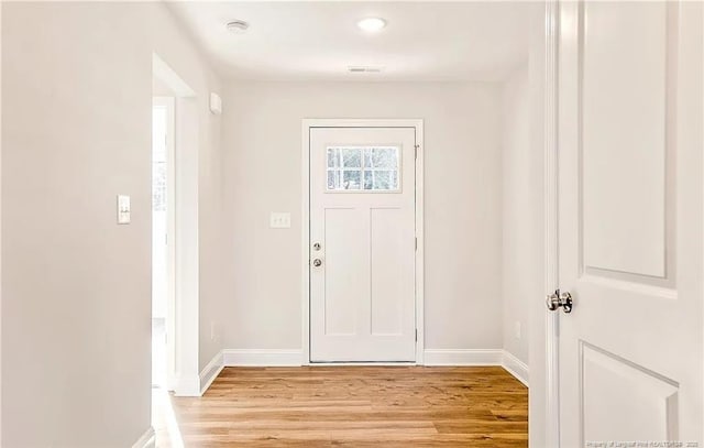 entrance foyer featuring light wood-type flooring