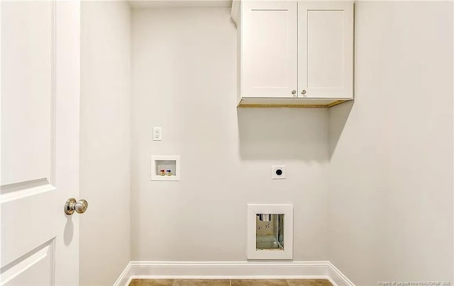 washroom featuring cabinets, washer hookup, and electric dryer hookup