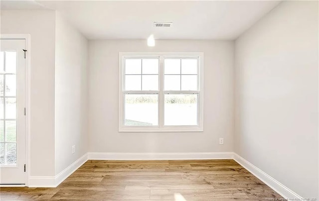 empty room featuring light hardwood / wood-style floors